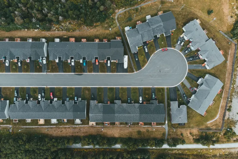 Status Anxiety Is Structural: How Your Neighborhood Was Literally Built to Make You Feel Behind